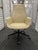 Poltrona Frau Downtown Executive swivel chair in cream (off-white) leather on a five-star black aluminum base with...