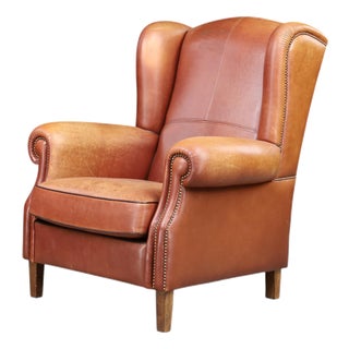 Patinated Cognac Leather Wingback Lounge Chair, Netherlands, 1960s For Sale