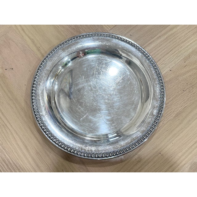Vintage Wilcox Silverplate serving tray. Lovely edge detail. Does show some noticeable wear. But still has some life left...