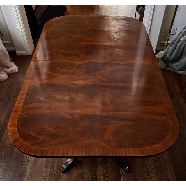 Val's Dollhouse is proud to present this stately solid mahogany estate sourced George III style dining suite by respected...