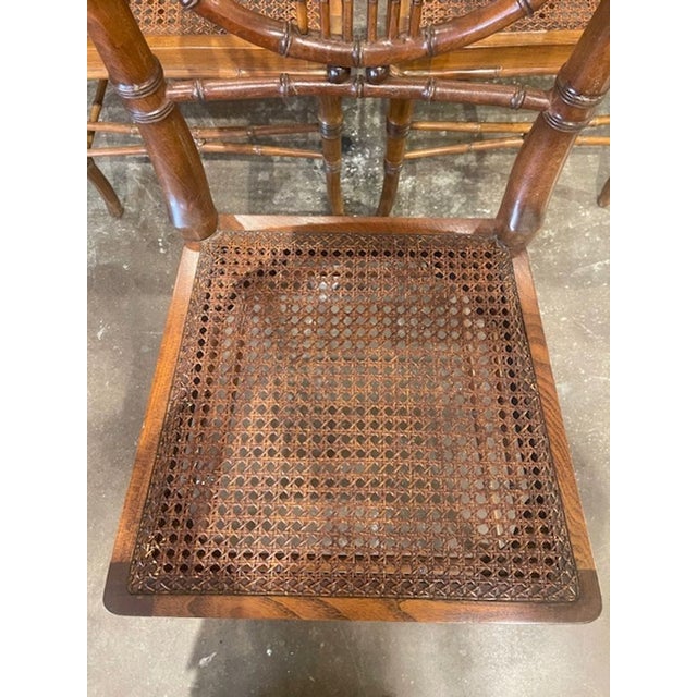 The Set of 8 English Walnut Bamboo Form Dining Chairs is a stylish and elegant addition to any dining room. Made from...