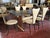 Elegant dining set made in the 1950s by Umberto Mascagni. The set consists of a table and six chairs, all completely...