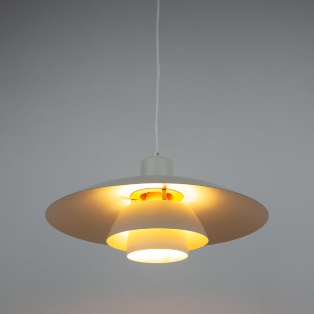 The ph 4/3 lamp is an absolute classic, designed by the renowned danish designer and architect poul henningsen. It has...