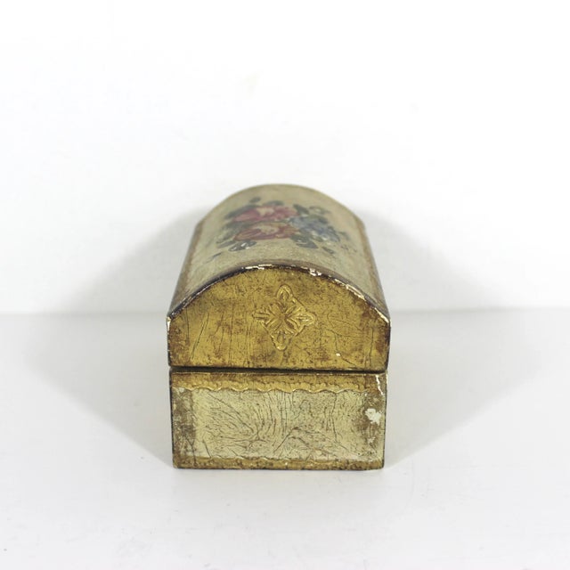 Gorgeous, dome topped vintage Italian Florentine gold gilt wood jewellery box with a hanged lid. Very pretty. This has...