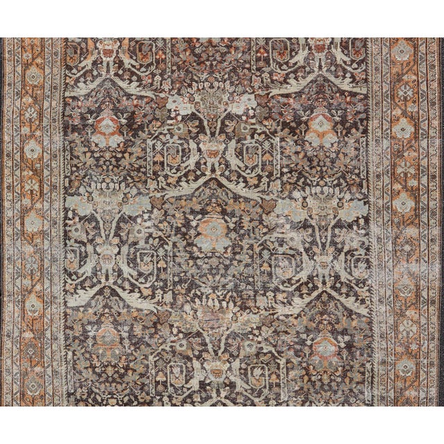 Measures: 10'3 x 16'0 Antique Persian Sultanabad Rug with Warm Brown Field and Allover Vine Design. Keivan Woven Arts/...
