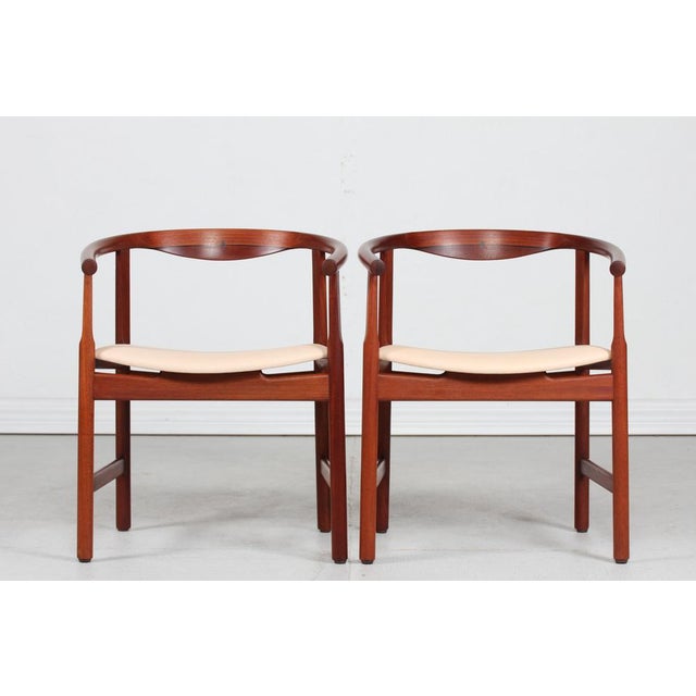 Pair of armchairs model pp 203 by danish designer hans j. Wegner in 1969 manufactured by pp furniture. the armchairs are...