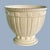 Classic Lenox Forum pedestal bowl in signature ivory porcelain with crisp vertical fluting and a raised decorative band...