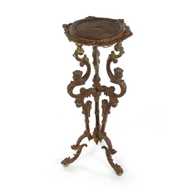 Patinated Cast Iron Bolster, in Very Good conditions. This piece is designed in the style of the selected designer and/or...