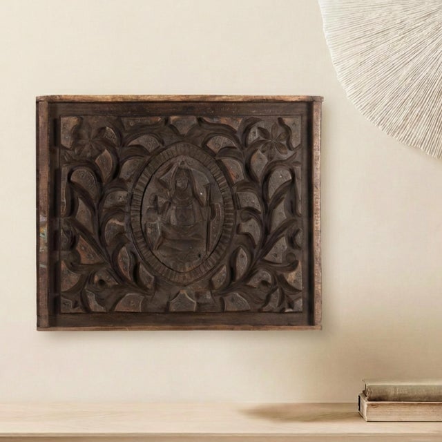 Dimensions: 19" W x 3" D x 25" H This Vintage Carved Wooden Printing Block Repurposed Wall Art is a captivating blend of...