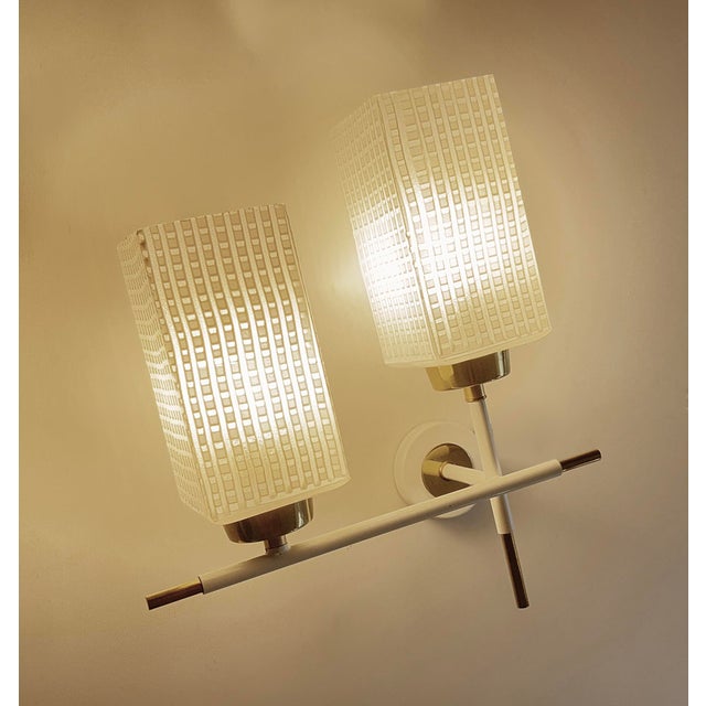Pair of Vintage french sconces with square opaline glass shades with a contrasting checkered serigraphed pattern , mounted...