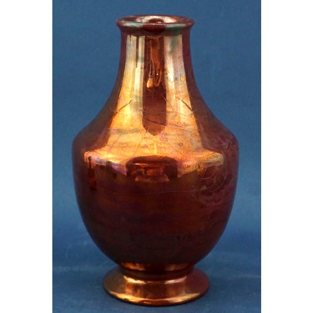 Item : A magnificent majolica ceramic vase, hand-crafted on a wheel, entirely glazed with bronze enamels and finished with...