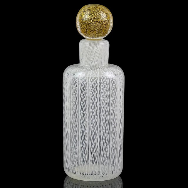 Beautiful vintage Murano hand blown white ribbons Italian art glass vanity perfume bottle with gold flecks. Documented to...
