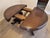 Solid Walnut Dining Table ca 1870. Round top with sculpted pedestal base. Base has wheels to ease moving and extending....