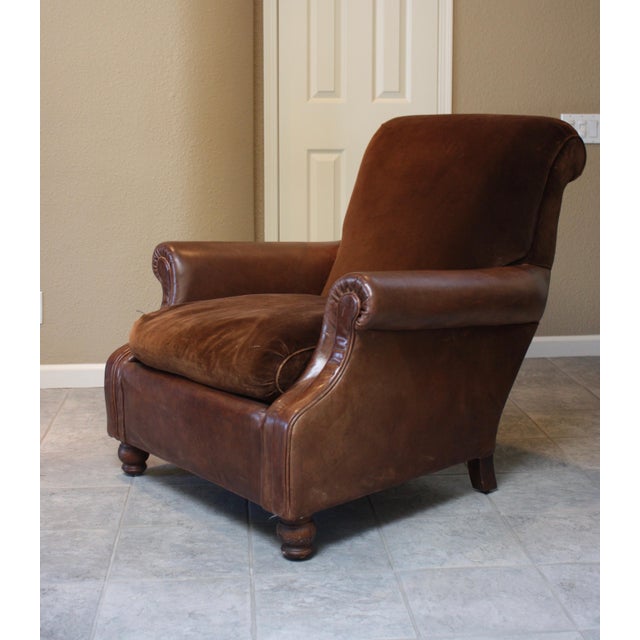 This chair features rolled arms and headrest, turned front legs, and a deep seat and high back. It’s a great place to get...