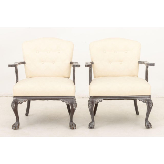 Pair of Modern Painted Wood Arm Chairs, each with white cotton upholstered cushion and on two front claw and ball feet....