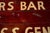 Ruby Red Vintage Double-Sided Bar Directional Advertising Sign For Sale - Image 8 of 13
