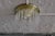 This flush mount or chandelier is made of glass with a brass base and remains in good vintage condition. Signed by...