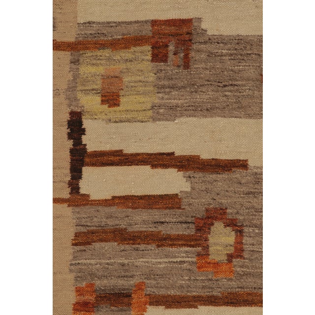 This 7x9 vintage rug is an exciting addition to Rug & Kilim’s Scandinavian collection. Handwoven in wool and dating to...
