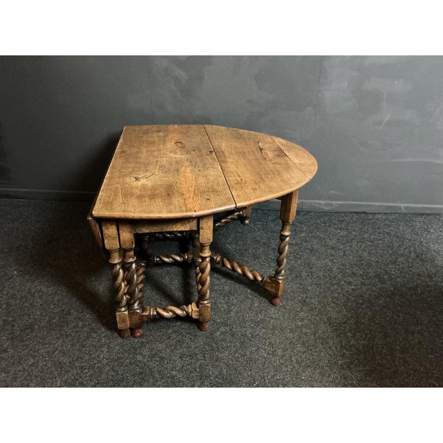 The table will take up to 8 chairs when fully opened. The dimensions showing are with the table closed.