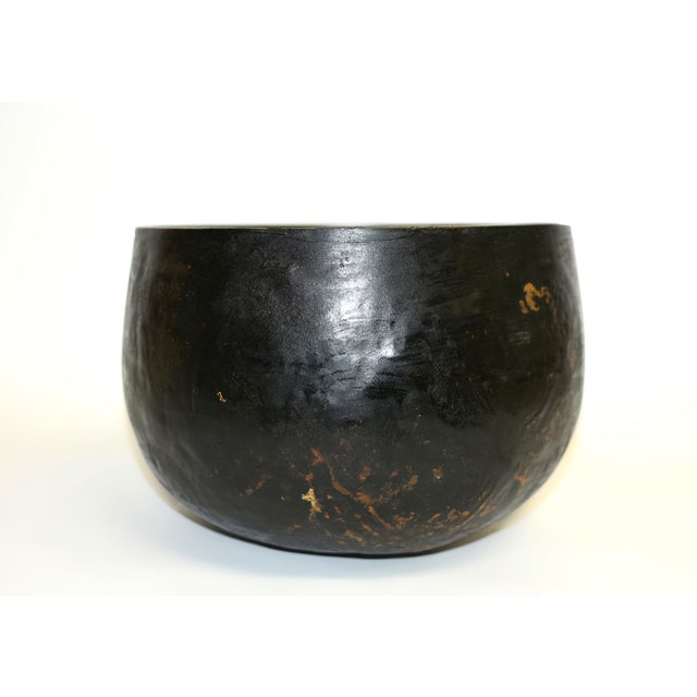 Nestled within the sanctity of time, an ancient Japanese Temple singing bowl resonates with history and reverence. Hand...