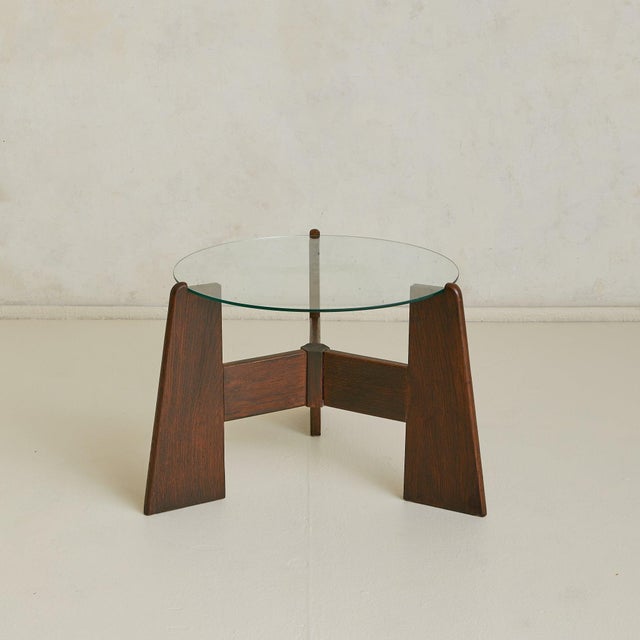 A Brutalist French coffee table sourced in the South of France, dating to the 1960s70s. The design is anchored by a solid...