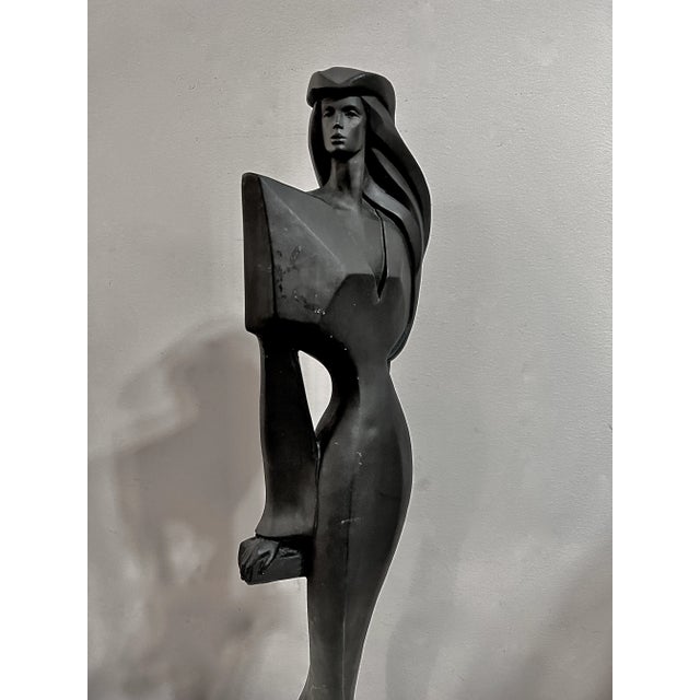 洋書 SCULPTURE metal-head-sculpture.jpg