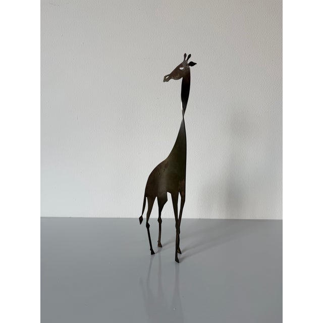 Striking 1980’s modernist steel giraffe sculpture by artist David Lesser, crafted from a single sheet of hand-cut steel....