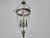 An elegant English bell jar lantern in polished nickel, dating to the mid-20th century and distinguished by its refined...