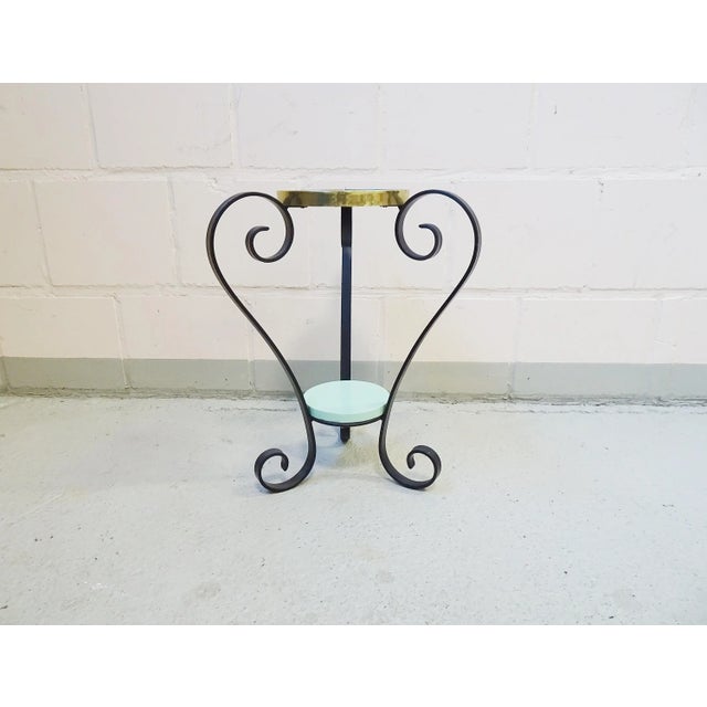Etagere for plants in wrought iron and wood. This plant stand has failed and an absolute joy to behold. Three curved black...