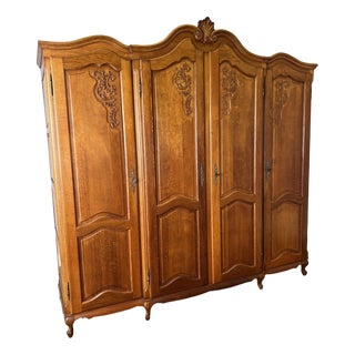 Vintage French Louis XVI Style Carved Oak 4-Door Wardrobe For Sale