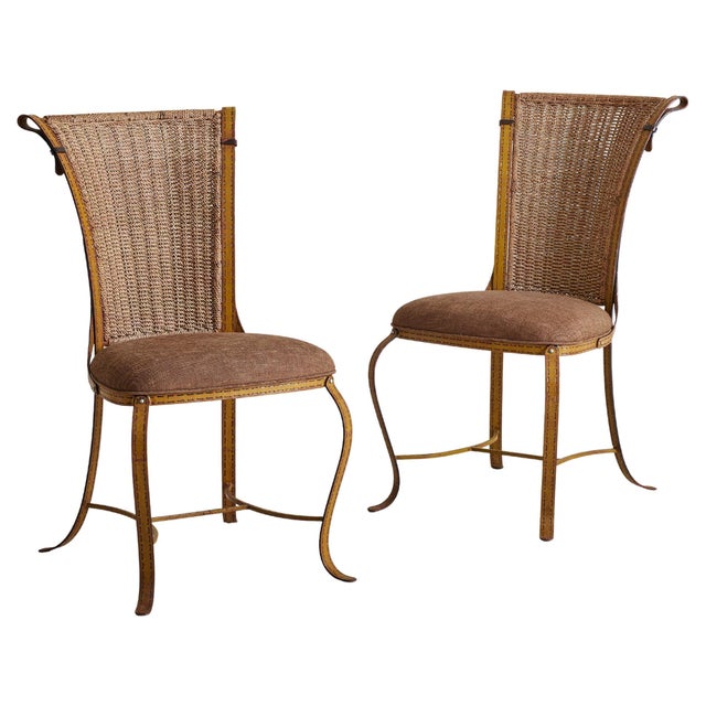 Sold and priced individually. A 1960s French accent chair, attributed to Jacques Adnet, seamlessly blending raw texture...