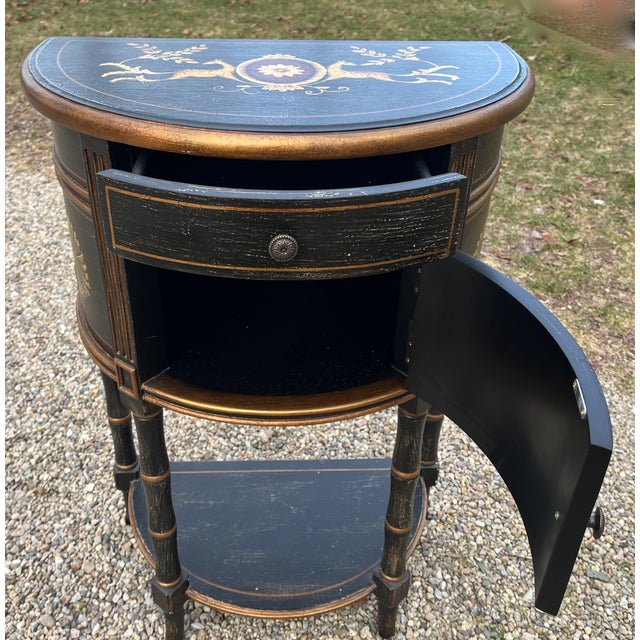 Make a small space memorable with this Asian inspired table for entryway or any room. Hand painted gold trim with deer,...