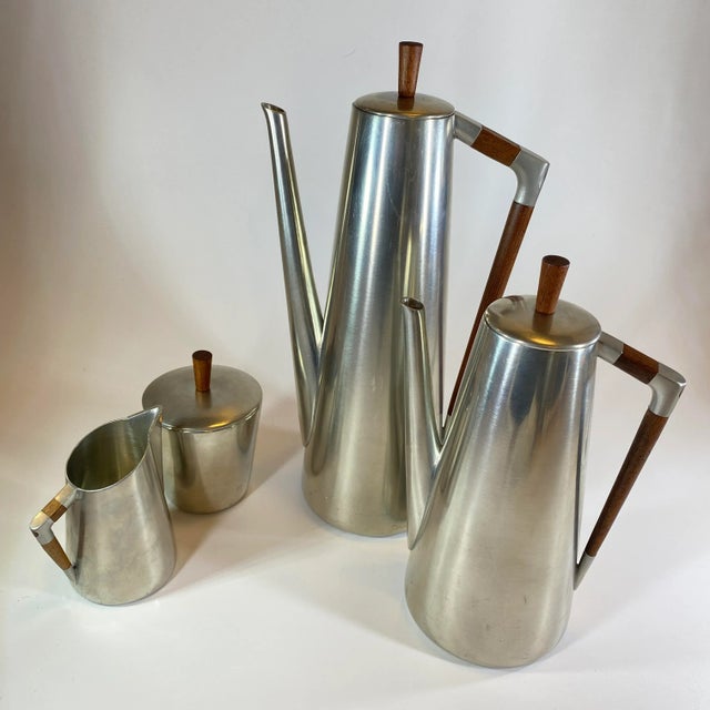 Mid Century Royal Holland KMD Tiel Daalderop pewter and teak coffee/tea set. From the 60’s with beautiful sleek lines Set...