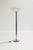 Quadrifogli floor lamp designed by Studio 6G and from Guzzini. The lamp features a chrome-plated metal frame and a cream-...