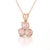 A romantic three-stone design featuring round-cut natural rose quartz arranged in a graceful trefoil formation, secured in...