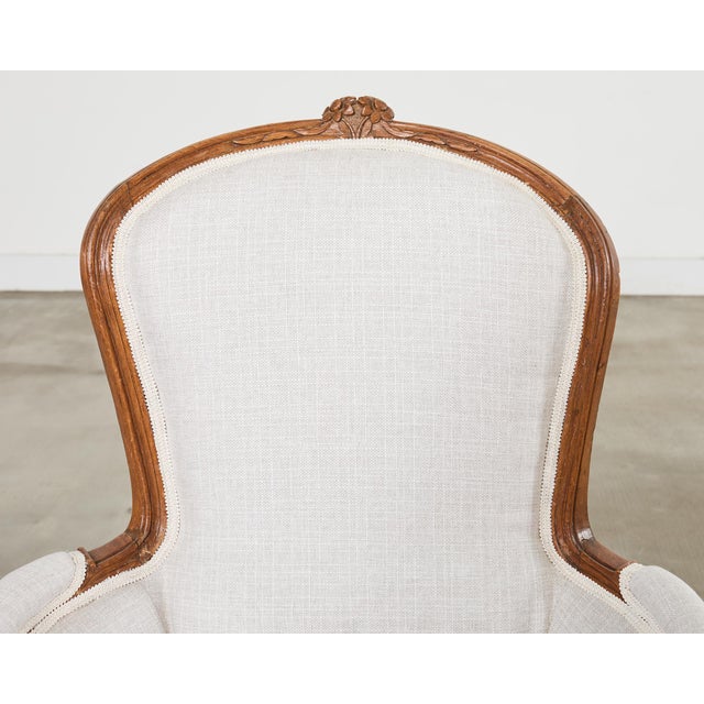 Pair of French Louis XV Style Walnut Bergeres With Linen For Sale - Image 14 of 18