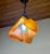 This elegant vintage Murano glass pendant light features thick, high-quality amber-colored glass that gently diffuses the...