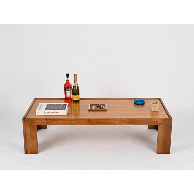 Marvelous Mid-Century large coffee table in a beautiful walnut wood designed by Afra & Tobia Scarpa and produced by...