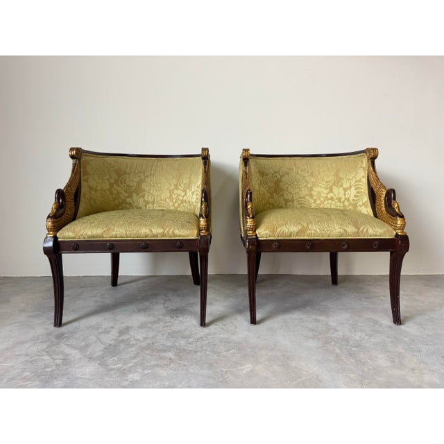 Elegant and richly detailed, this pair of vintage Neoclassical-style lounge chairs embodies timeless sophistication. Each...