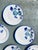 with their pretty stylized blue Art Deco flowers and border, these plates from the Keller et Guerin pottery in Lunéville...