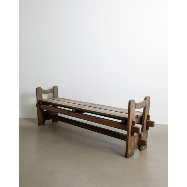 A very rare and early swedish modern wooden "skoga" bench in stained and patinated pine designed by axel einar hjorth and...