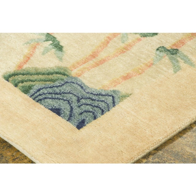 Hand-knotted in wool, this 3x8 contemporary runner captures the serene elegance of Chinese Deco carpets. Featuring slender...