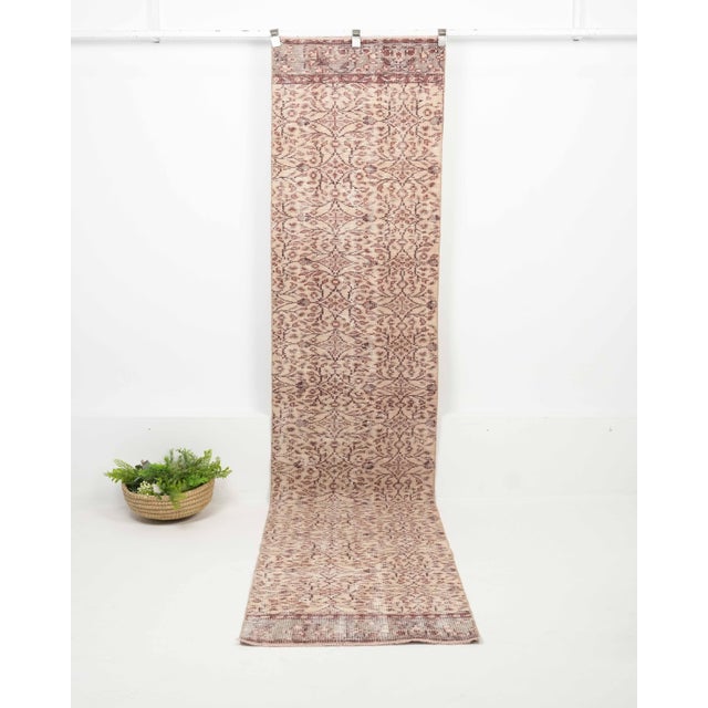 Vintage Turkish Hand-Knotted Runner rug is a semi-antique vintage runner rug. The '70s Eastern region of Anatolian's...