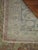 A late 19th century formal Turkish Sivas rug with a rosy red background, silver medallion and silver border. Other accent...