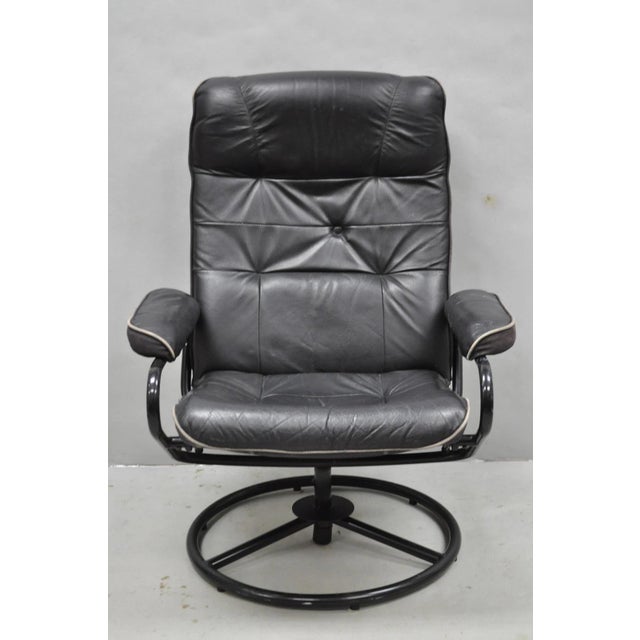Vintage Mid Century Modern Black Leather & Canvas Swivel Reclining Lounge Chair in the Style of Ekornes "Stressless"....