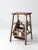 This is a vintage folding step stool circa 1930s. The wooden library ladder features fold-out steps that collapse in for...
