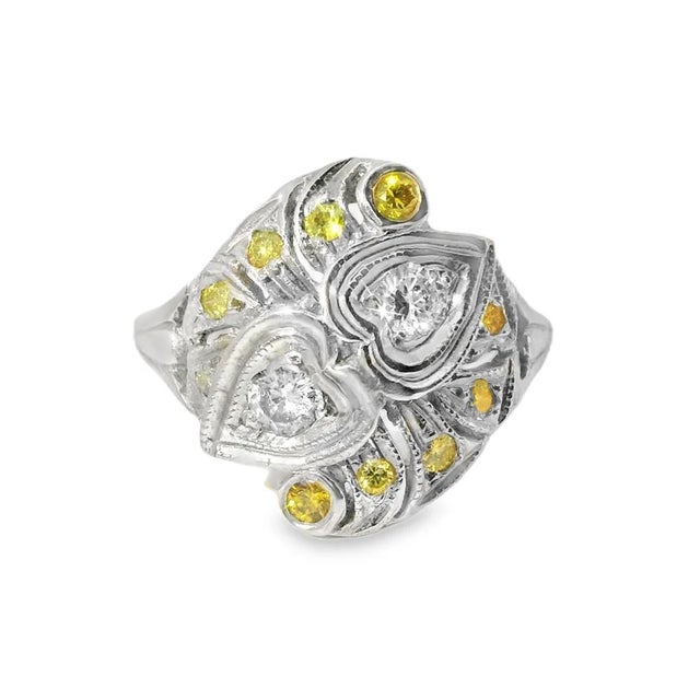 Antique Estate 14K white gold filigree ring featuring 10 natural yellow diamonds and 2 round white diamonds (G color, VS...