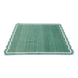 Handmade Cotton Vegetable Dyed Scalloped Edge Rug in Forest Green With Cream and Teal Blue Border - 8x10 For Sale