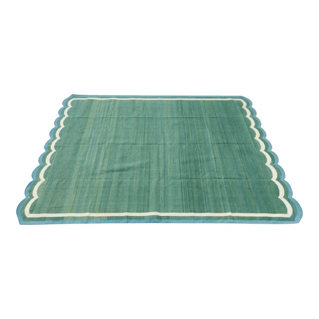 Handmade Cotton Vegetable Dyed Scalloped Edge Rug in Forest Green With Cream and Teal Blue Border - 8x10 For Sale