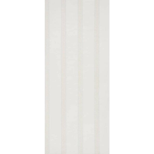 An antique wallpaper swatch inspired the enchanting details of this traditional, three-color stripe. Screen printed in the...